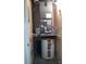 View of a utility room with water heater and HVAC system at 5727 Dockside Dr, Charlotte, NC 28227