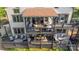 Multi-level back porch featuring ample seating, dining area, and scenic views of the yard at 5888 Wood Duck Way, Catawba, NC 28609
