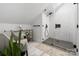 Chic bathroom boasts patterned tile, and a glass shower with dark hardware at 5888 Wood Duck Way, Catawba, NC 28609