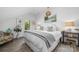 Bright bedroom with plush bed, wooden floors, and verdant backyard view at 5888 Wood Duck Way, Catawba, NC 28609
