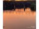 Scenic view of a bridge over the river at sunset reflecting on the water at 5888 Wood Duck Way, Catawba, NC 28609