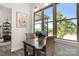 Dining area features table and chairs with great lake views from the window at 5888 Wood Duck Way, Catawba, NC 28609