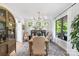 Bright dining room features hardwood floors, a stylish chandelier, neutral decor and an exterior view at 5888 Wood Duck Way, Catawba, NC 28609