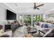 Comfortable living room with a ceiling fan, modern furniture, and a view to the outdoors at 5888 Wood Duck Way, Catawba, NC 28609