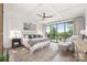 Spacious main bedroom with tray ceiling, ceiling fan, and access to balcony with lake views at 5888 Wood Duck Way, Catawba, NC 28609