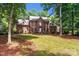 Charming brick home with manicured lawn and mature trees at 654 9Th N St, Albemarle, NC 28001