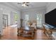 Comfortable living room with hardwood floors and a view of the front entrance at 654 9Th N St, Albemarle, NC 28001