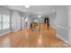A spacious upstairs bonus room with multiple windows and hardwood flooring throughout at 654 9Th N St, Albemarle, NC 28001