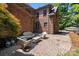 Brick patio with outdoor seating, perfect for entertaining guests at 654 9Th N St, Albemarle, NC 28001