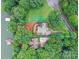 Aerial view showcases the home, property lines, driveway, landscaping, and water access at 7221 High Point Ct, Charlotte, NC 28278