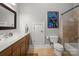 Bathroom with modern fixtures, updated tile, and a large vanity at 7221 High Point Ct, Charlotte, NC 28278
