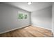 Empty bedroom with a lot of light and hardwood floors at 756 Logan St, Mooresville, NC 28115