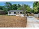 Well-maintained home with a new driveway and landscaping, offering great curb appeal and a move-in ready experience at 756 Logan St, Mooresville, NC 28115