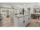 Kitchen island overlooks the living and dining rooms at 756 Logan St, Mooresville, NC 28115