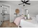 Another view of the bright main bedroom, showing the ensuite bathroom entrance at 756 Logan St, Mooresville, NC 28115