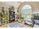 Inviting room with hardwood floors, large window, area rug, and vaulted ceilings. A perfect place to relax at 9137 Brightleaf Pl, Charlotte, NC 28269