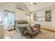 Comfortable main bedroom featuring built-in storage, hardwood floors, bench seating, and plenty of natural light at 9137 Brightleaf Pl, Charlotte, NC 28269