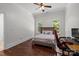 Bedroom with hardwood floors, natural light and a comfortable bed at 9261 Marvin School Rd, Marvin, NC 28173