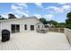 Enjoy outdoor living on the spacious back deck with a built-in hot tub and ample space for entertaining at 9319 Chislehurst Rd, Mint Hill, NC 28227