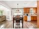 Bright dining space with view into the kitchen area at 9319 Chislehurst Rd, Mint Hill, NC 28227