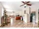 Spacious living room with an open floor plan, lovely hardwood floors, comfortable seating, and office space at 9319 Chislehurst Rd, Mint Hill, NC 28227