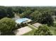 An aerial view of a pool, volleyball court, basketball court and other community features at 1003 Snake River Ct, Monroe, NC 28110