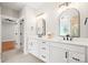 Bathroom with double vanity, modern fixtures, and ensuite access at 1004 E Sandy Ridge Rd, Monroe, NC 28112