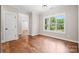 Bright bedroom with hardwood floors and natural light at 1004 E Sandy Ridge Rd, Monroe, NC 28112