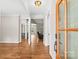 Inviting entryway showcases gleaming hardwood floors and neutral walls, leading to open living spaces with ample natural light at 1004 E Sandy Ridge Rd, Monroe, NC 28112