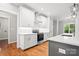 Beautiful kitchen with white cabinets, stainless steel appliances, and hardwood floors at 1004 E Sandy Ridge Rd, Monroe, NC 28112