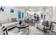 Open living area with a stylish seating arrangement, open to the modern kitchen and dining space at 10339 Lakeshore Dr # 85, Lancaster, SC 29720