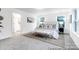 Spacious main bedroom offering natural light, neutral tones, and access to the luxurious main bathroom at 10339 Lakeshore Dr # 85, Lancaster, SC 29720