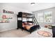bedroom with bunk beds and lots of natural light at 106 Tuppy Ct, Statesville, NC 28625
