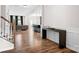 Open-concept living space with hardwood floors, modern decor, and plenty of natural light at 106 Tuppy Ct, Statesville, NC 28625