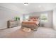 Main bedroom with tray ceiling, and luxury finishes at 106 Tuppy Ct, Statesville, NC 28625