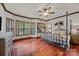 Bedroom with decorative ceiling fan and lots of natural light at 10919 Valley Spring Dr, Charlotte, NC 28277