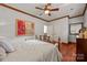 Bedroom with hardwood floors, modern lighting fixtures, and a closet at 10919 Valley Spring Dr, Charlotte, NC 28277