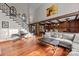 Cozy living room with staircase and view of kitchen at 10919 Valley Spring Dr, Charlotte, NC 28277