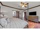 This main bedroom features a wooden accent ceiling, barn door to the bathroom and a wooden floor at 10919 Valley Spring Dr, Charlotte, NC 28277