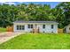 Charming, updated one-story home featuring a metal roof, fresh white paint and beautiful landscaping at 111 Wolfe Rd, Shelby, NC 28152