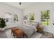 Nicely staged bedroom with lots of natural light and soft decor at 113 Woodside Ave, Gastonia, NC 28054