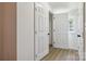 Image shows a closet interior with wood-look flooring and ample storage space at 113 Woodside Ave, Gastonia, NC 28054