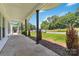 Spacious porch with dark trim and small manicured bushes creating a calming ambiance at 113 Woodside Ave, Gastonia, NC 28054