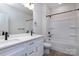 Bright bathroom featuring a double sink vanity, toilet and bathtub with shower at 118 Durham Rd, Stanley, NC 28164