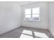 Carpeted bedroom with a large window at 118 Durham Rd, Stanley, NC 28164