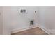 Laundry room featuring hookups and laminate flooring at 118 Durham Rd, Stanley, NC 28164