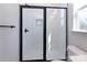 Modern shower with black trim and white subway tile at 118 Durham Rd, Stanley, NC 28164