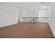 Bright loft area features hardwood floors and neutral walls at 12009 Grinstead Ln # 303, Charlotte, NC 28278