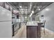 Finished basement with a modern wet bar featuring granite counters and stainless appliances at 122 Long Cove Ln, Mooresville, NC 28117