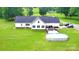 Charming home with a large yard, deck, and above-ground pool at 1238 Shinnville Rd, Cleveland, NC 27013